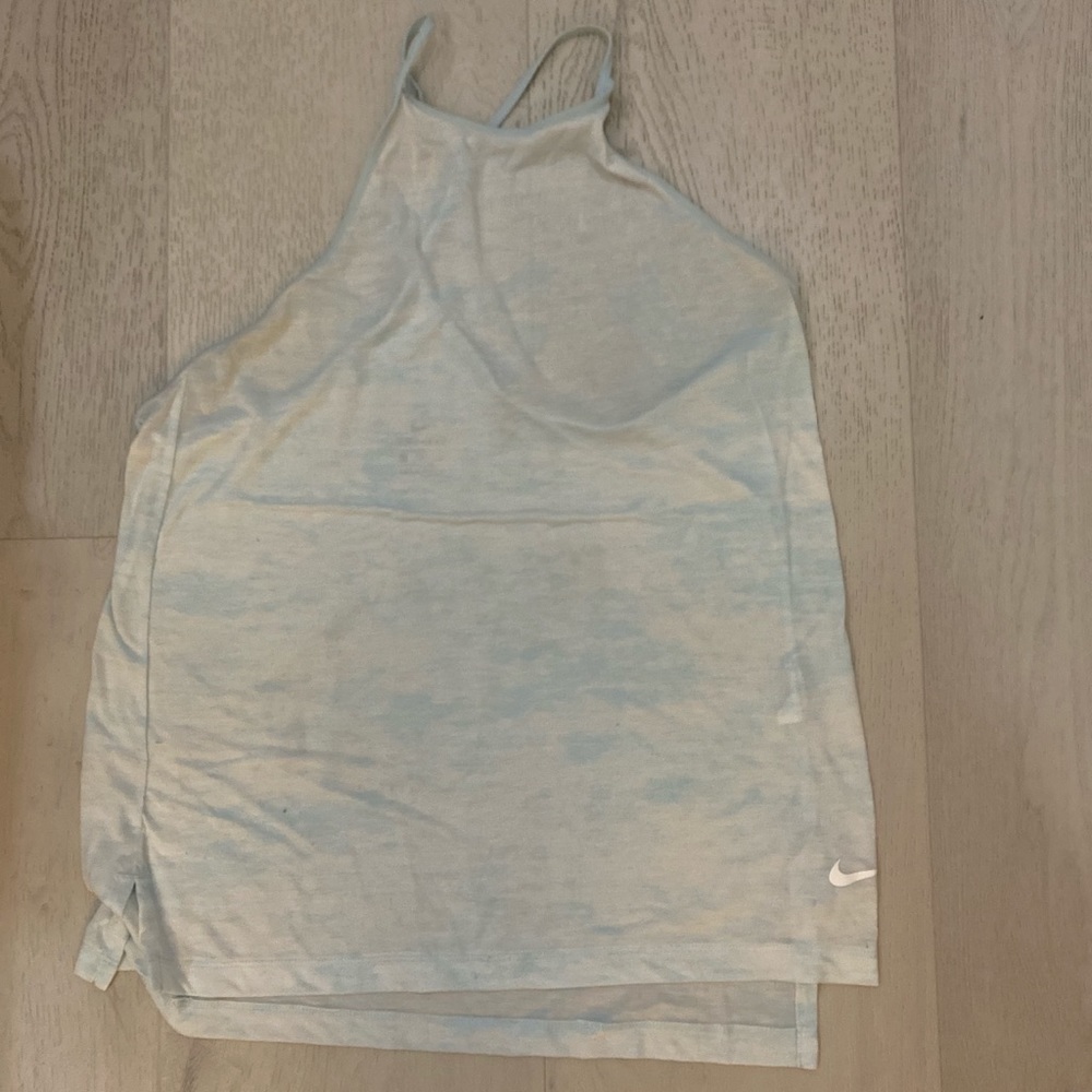 Nike Dri Fit tank top. In size small. Color is a light blue/sheer